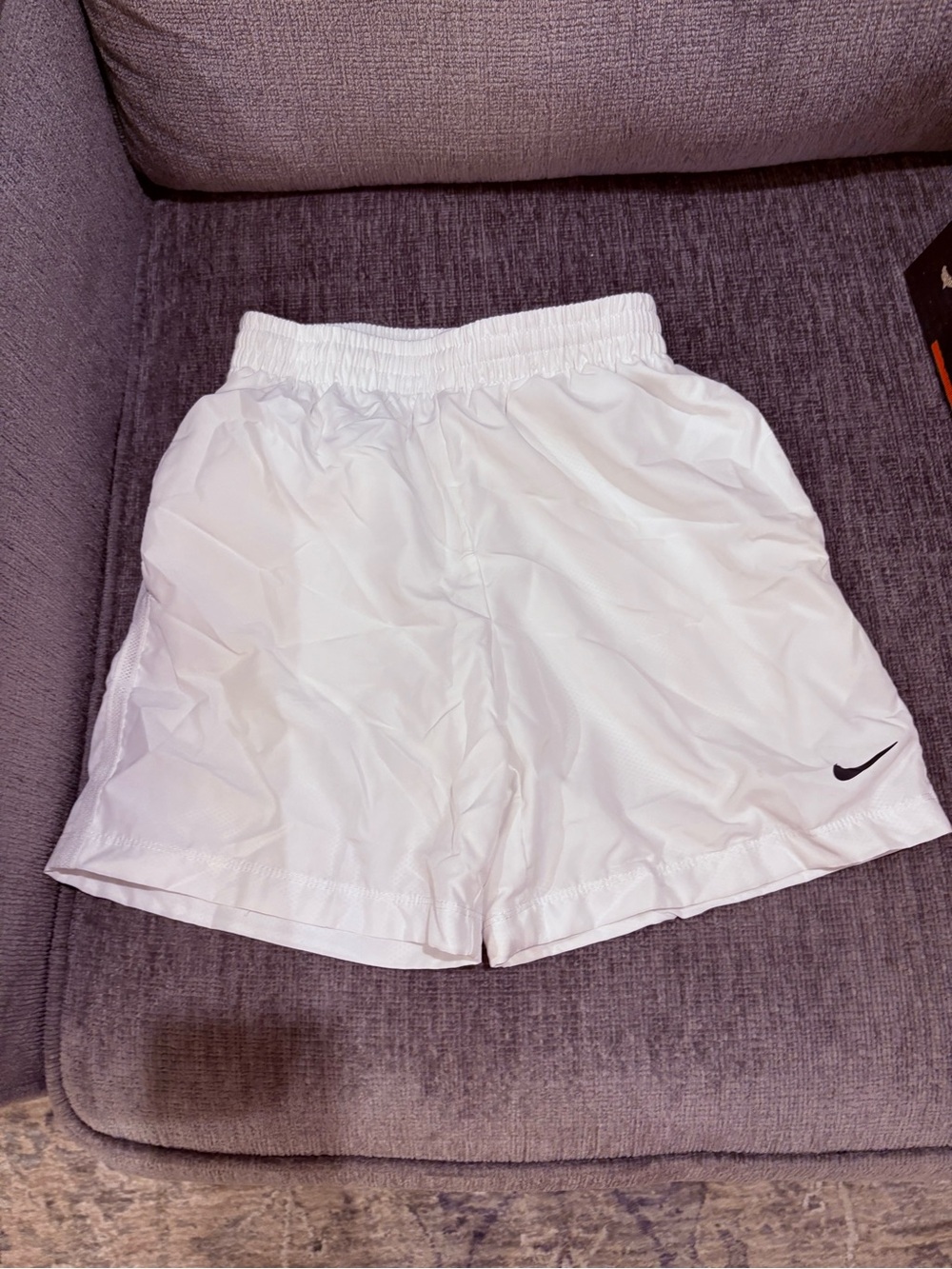 Nike White Casual Athletic Shorts with Black Swoosh